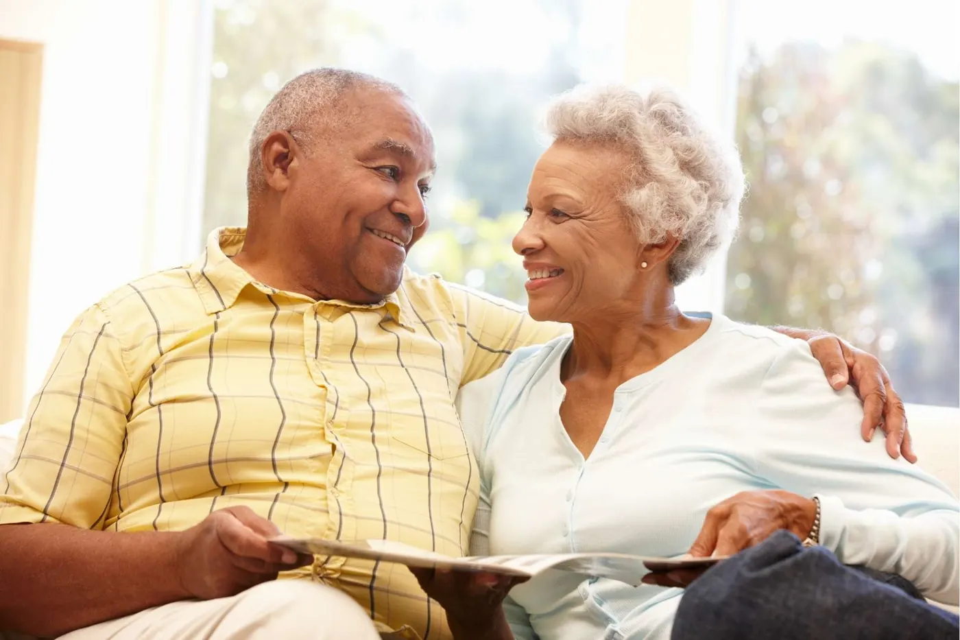 A senior couple relaxing comfortably